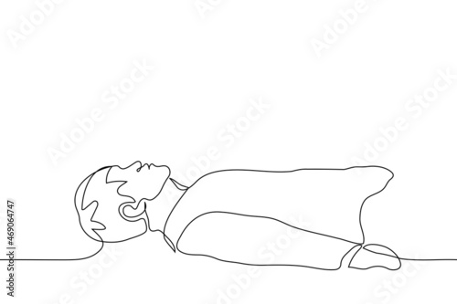 man lies on his back on the floor - one line drawing vector. the concept of fatigue, falling asleep, loss of strength, physical impotence, lack of energy
