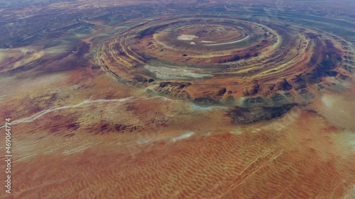 Aerial view of Richat Structure also called Guelb er Richât in Arabic Qalb ar-Rīšāt is circular geological feature in Sahara's Adrar Plateau westcentral Mauritania, Northwest Africa 4k animation photo