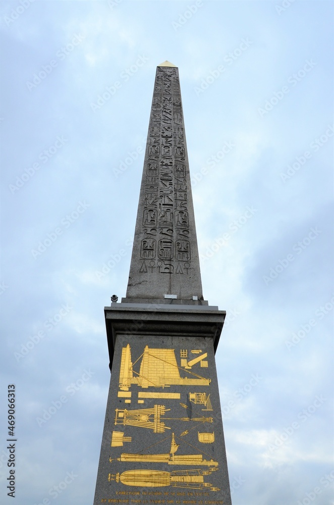 Obelisque de Louxor at Place de la Concorde against a cloudy sky. Paris, France