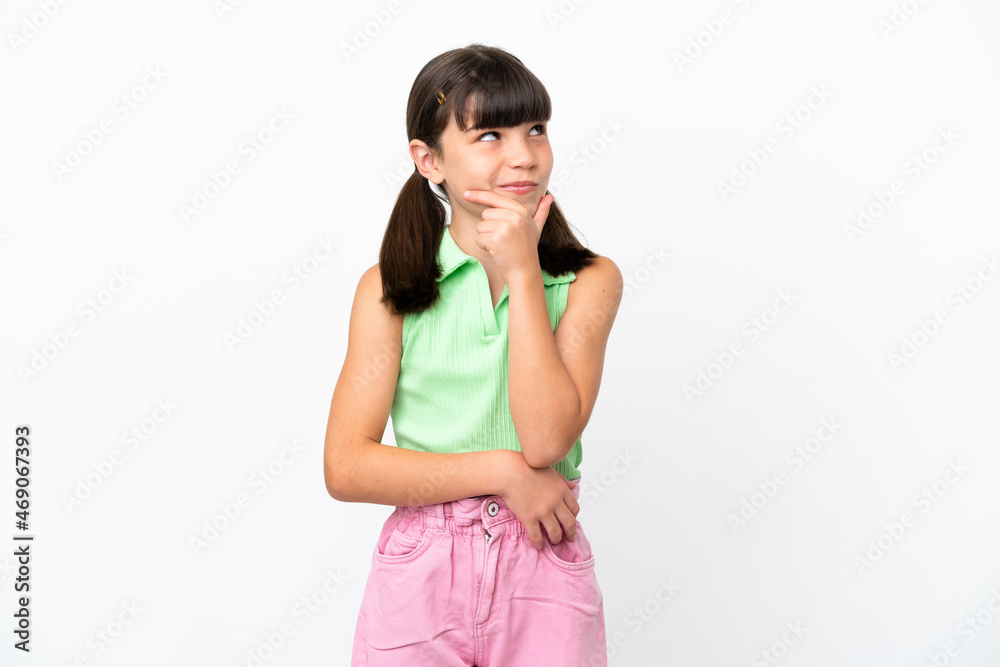 Little caucasian kid isolated on white background thinking an idea while looking up Little caucasian kid isolated on white background thinking an idea while looking up