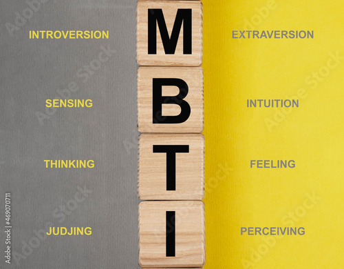 Fotografie MBTI test and its types, dichotomies concept. Acronym on cubes.