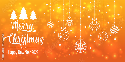 merry christmas and happy new year with bokeh and lens flare pattern on summer orange color background