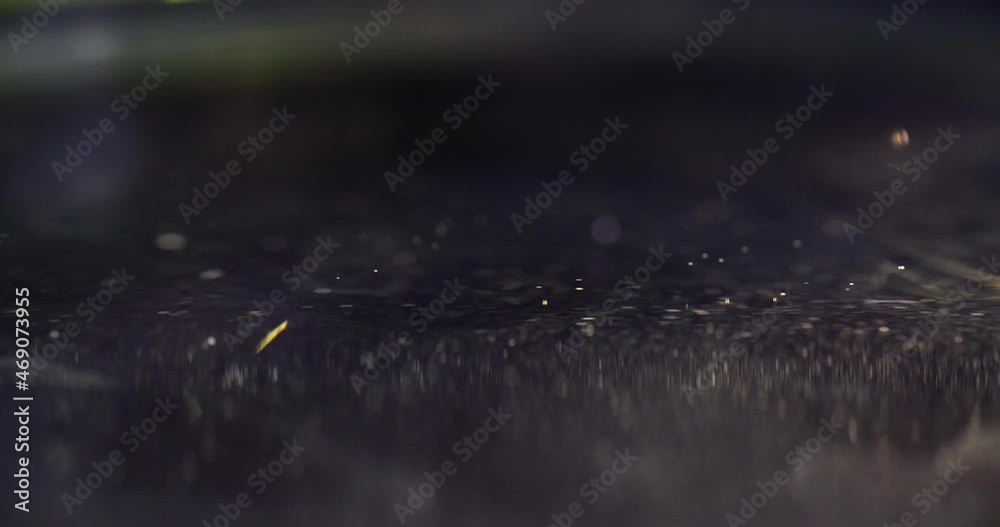 Yellow drop falling on surface of oil closeup 4k movie Yellow drop falling on surface of oil closeup 4k movie