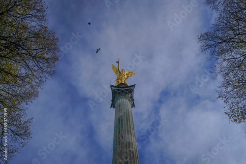 Wallpaper Mural Golden statue with trees and clouds in the background | Friedensengel, Munich, Germany Torontodigital.ca