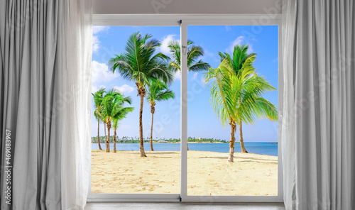 large glass door overlooking the beach