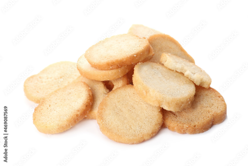 Pile of delicious crispy rusks on white background Pile of delicious crispy rusks on white background