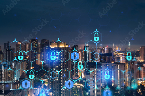 Photography Glowing padlock hologram, night panoramic city view of Kuala Lumpur, Malaysia, Asia