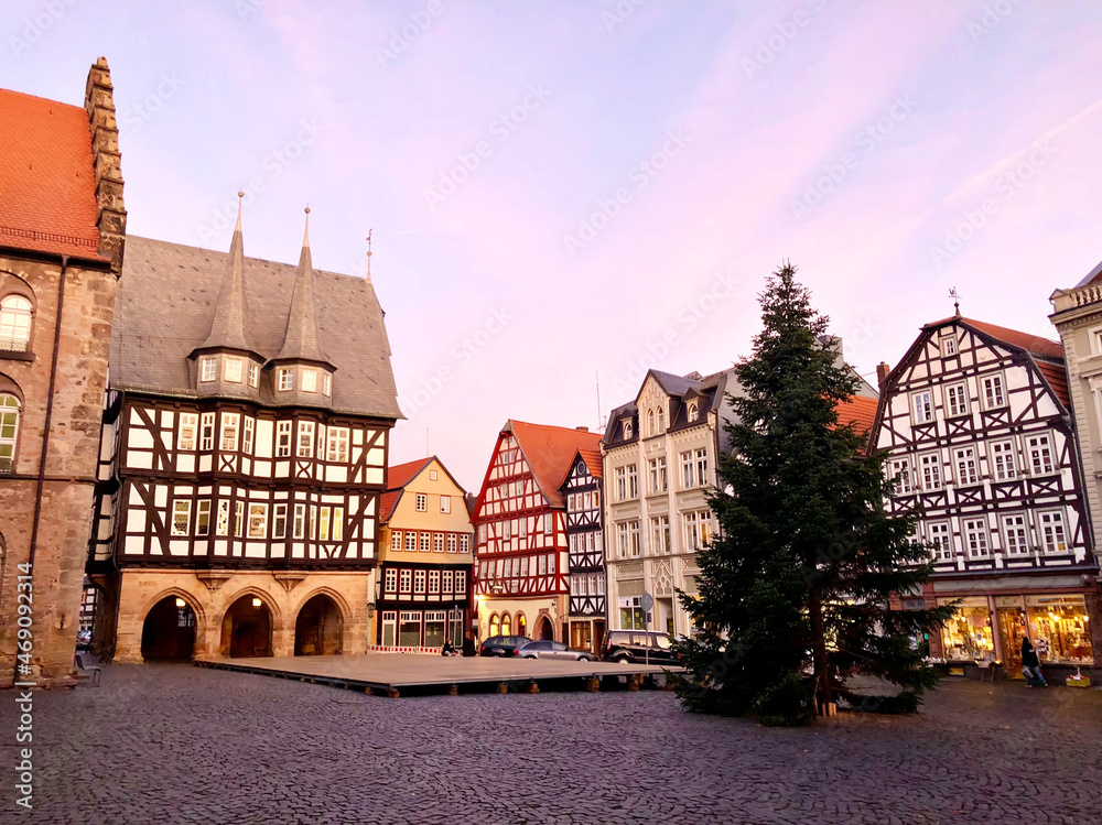 Naklejka premium View of Alsfeld town hall, Weinhaus and church on main square, Germany. Historic city in Hesse, Vogelsberg, with old medieval frame half-timbered houses on Christmas time and tree.