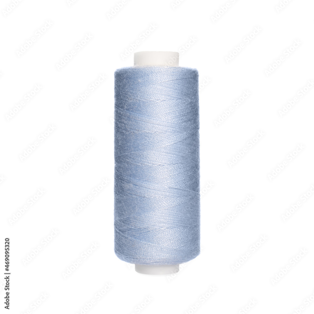 Spool of light blue sewing thread isolated on white Spool of light blue sewing thread isolated on white