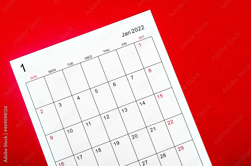 January 2022 calendar sheet on red background. January 2022 calendar sheet on red background.
