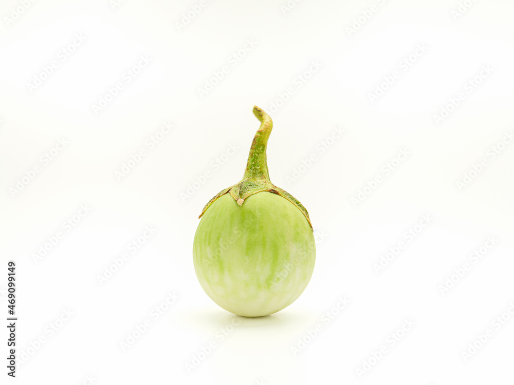 Close-up of Thai eggplant or green brinjal isolated on white background Close-up of Thai eggplant or green brinjal isolated on white background