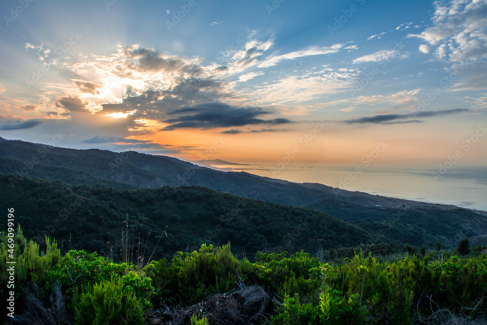 Obraz premium landscape of mountains, sunset and clouds with a beautiful sky, the nature of Algeria in North Africa, Maghreb, plains and grass in the mountain, Mediterranean climate, Forest and green trees. sunrise