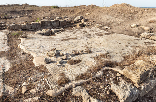 Remains  of an ancient mosaic of a 6th-century Orthodox church at Tel Shikmona, on the shores of the Mediterranean Sea, near Haifa city, on north of Israel photo