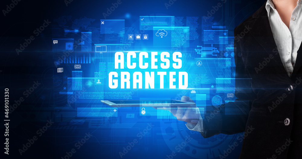 Person holding tablet, security concept Person holding tablet, security concept
