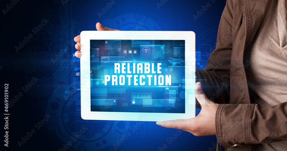 Person holding tablet, security concept Person holding tablet, security concept