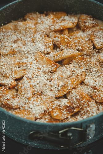 Close-up of raw apple pie in baking dish