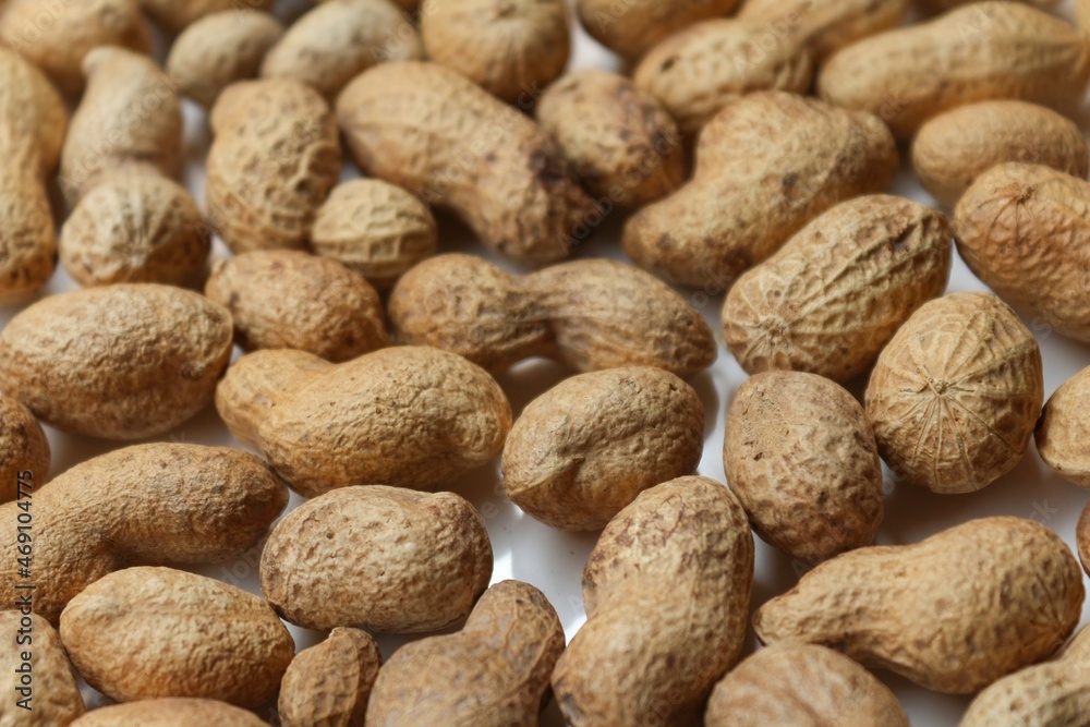 peanut in a shell texture. food background of peanuts. Top view. peanut in a shell texture. food background of peanuts. Top view.