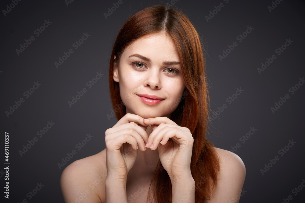 woman with bare shoulders and beautiful hairstyle close-up attractive look woman with bare shoulders and beautiful hairstyle close-up attractive look