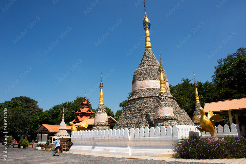 Wat Chedi Hoi or stupa gigantic fossilised oyster shells aged millions of years temple for thai people and foreign travelers travel visit respect praying in Lad Lum Kaew city in Pathum Thani, Thailand