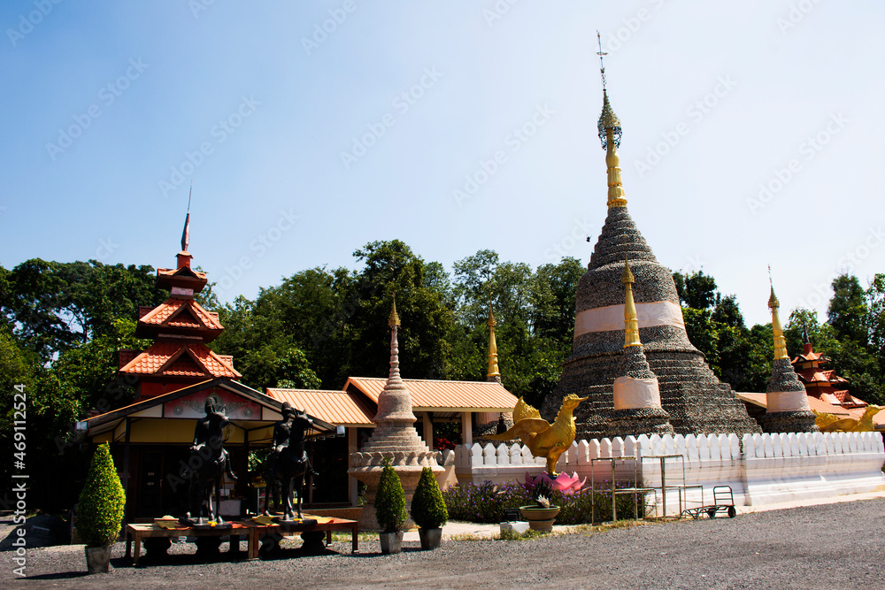 Wat Chedi Hoi or stupa gigantic fossilised oyster shells aged millions of years temple for thai people and foreign travelers travel visit respect praying in Lad Lum Kaew city in Pathum Thani, Thailand