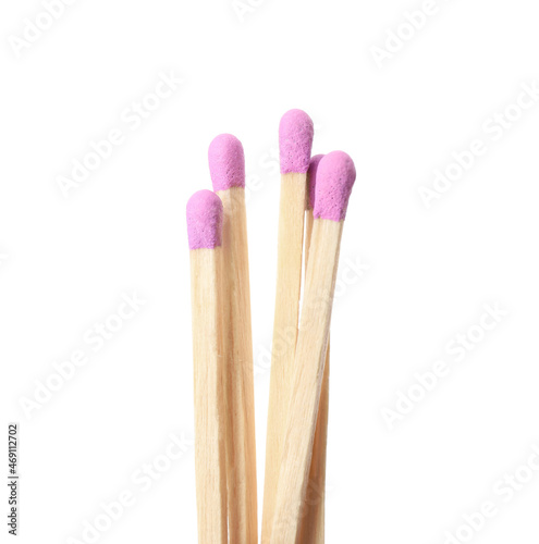 Matches with lilac heads on white background