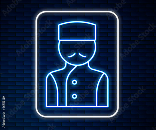 Glowing neon line Concierge icon isolated on brick wall background. Vector