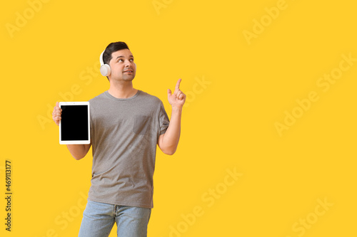 Young man with tablet compu...