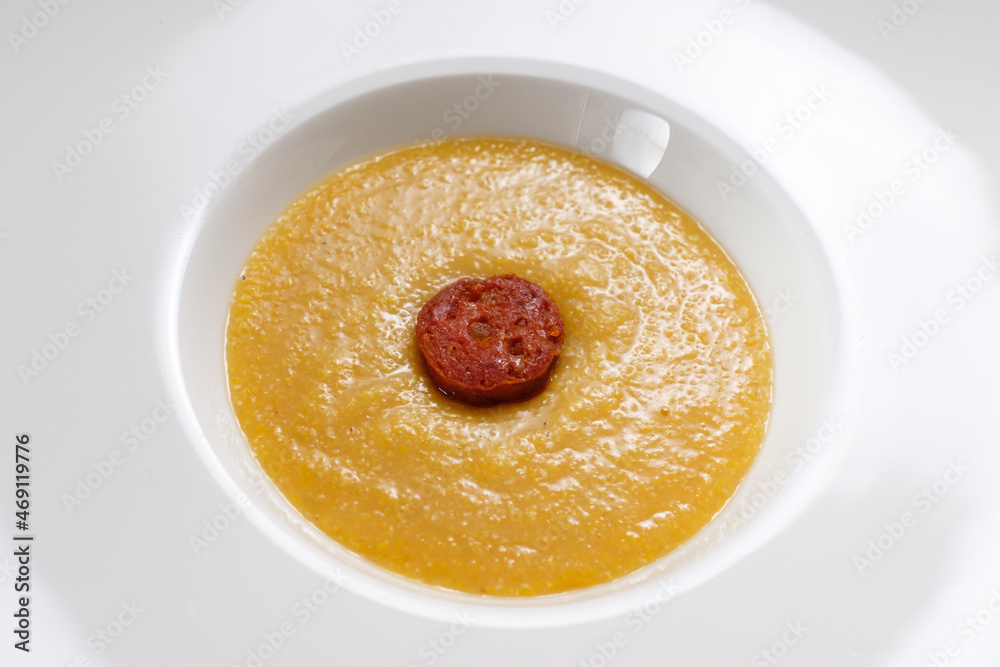 Italien polenta with parmesan cheese and chorizo sausage Italien polenta with parmesan cheese and chorizo sausage