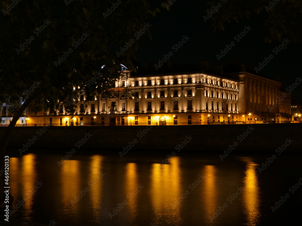 The reflection of the lights of Paris in the Seine river. October 2021, Paris France.