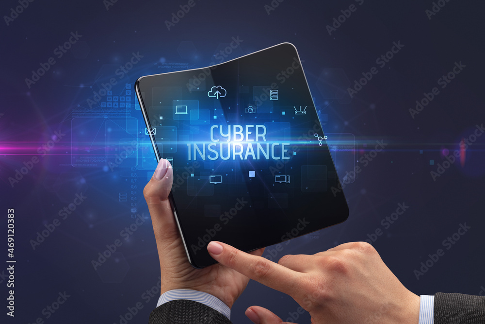 Businessman holding a foldable smartphone, security concept Businessman holding a foldable smartphone, security concept