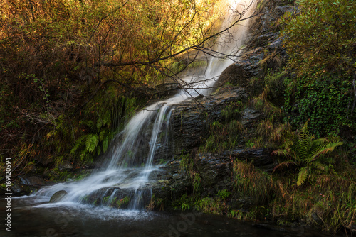 Waterfall with silk effect in the Lanjaron river, Sierra Nevada, Granada. photo