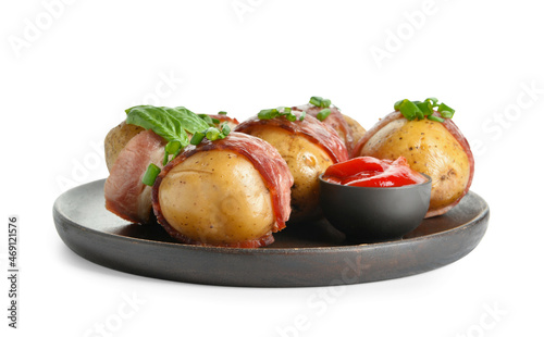 Plate of tasty baked potatoes with bacon and tomato sauce on white background
