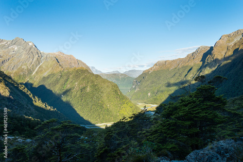 Routeburn Valley with the afternoon sun casting shadows of surrounding mountains, Routeburn Track, Great Walk of New Zealand.