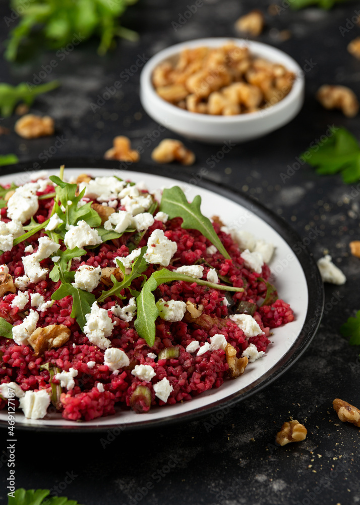 Bulgur salad with beetroot, walnuts, arugula and feta cheese. Healthy diet food Bulgur salad with beetroot, walnuts, arugula and feta cheese. Healthy diet food