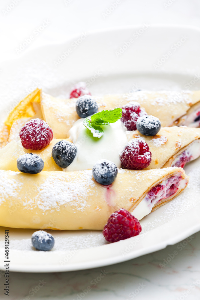 pankaces filled with blueberries, raspberries and cream pankaces filled with blueberries, raspberries and cream