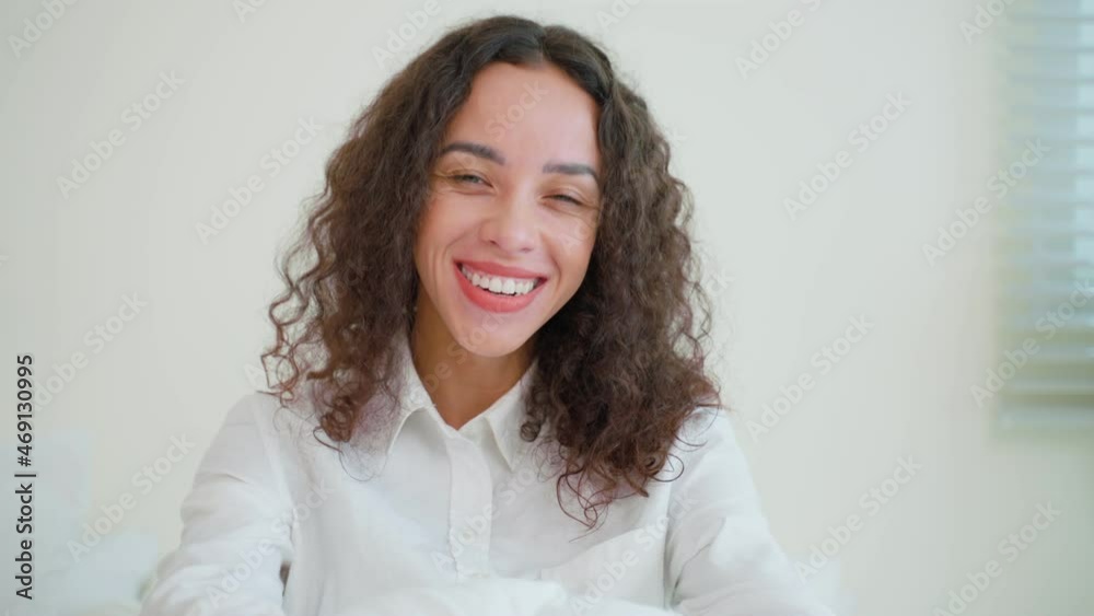 Portrait of Latino Beautiful girl in pajamas smile and look at camera.
Portrait of Latino Beautiful girl in pajamas smile and look at camera.