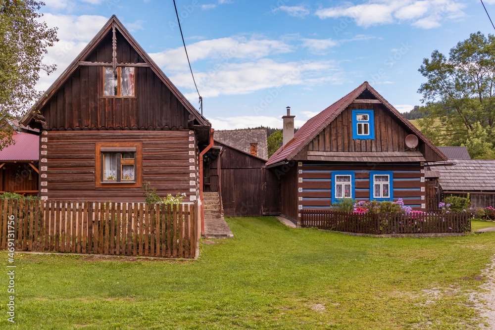 Old wooden houses in village Osturna, Spiska magura region, Slovakia Old wooden houses in village Osturna, Spiska magura region, Slovakia