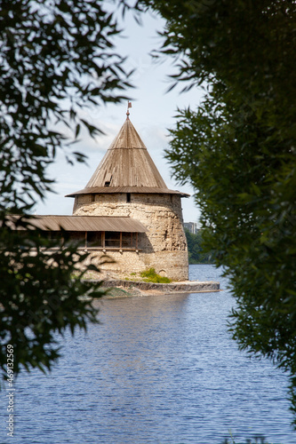 Stone tower and Pskov Kremlin fortress wall at the confluence of two rivers, Russia