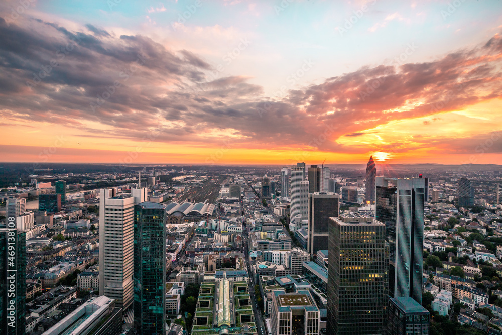 Skyline view from a viewing platform. Frankfurt am Main in Germany in the evening with a dreamlike sunset in the middle of the skyline. Great city photo of the financial district