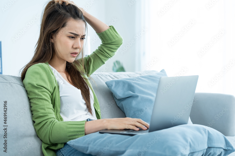 Young exhausted Asian sick business woman worker working from home. Young exhausted Asian sick business woman worker working from home.