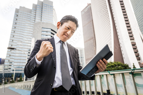 Photography Japanese businessman in Tokyo with formal business suit