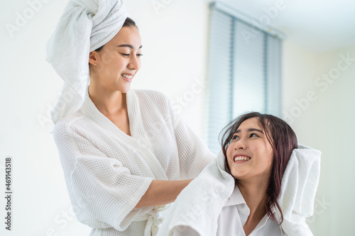 Asian beautiful lesbian couple spending morning leisure time together. 