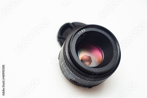Black camera lens isolated in white background