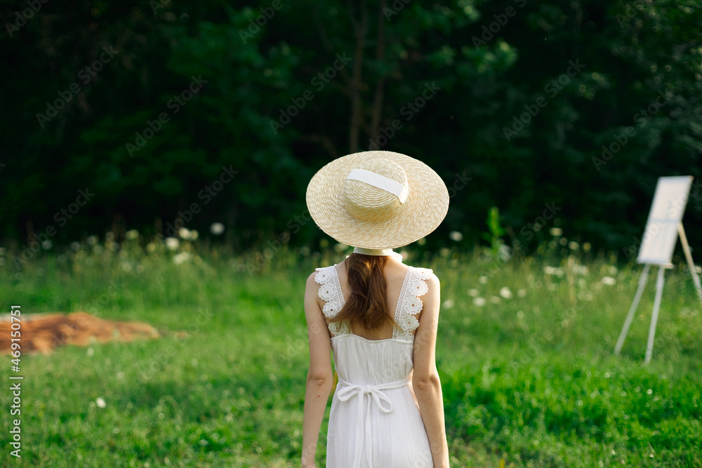 pretty woman in white dress outdoors easel art