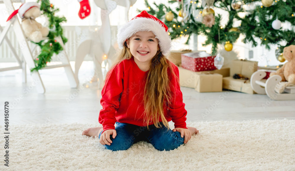 Child girl in Christmas time