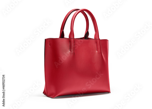 Red female leather bag isolated on white background with shadow, side view