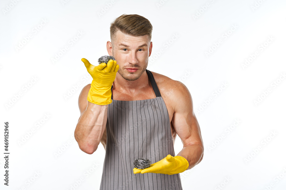 pumped up man in rubber gloves metal sponges close-up pumped up man in rubber gloves metal sponges close-up