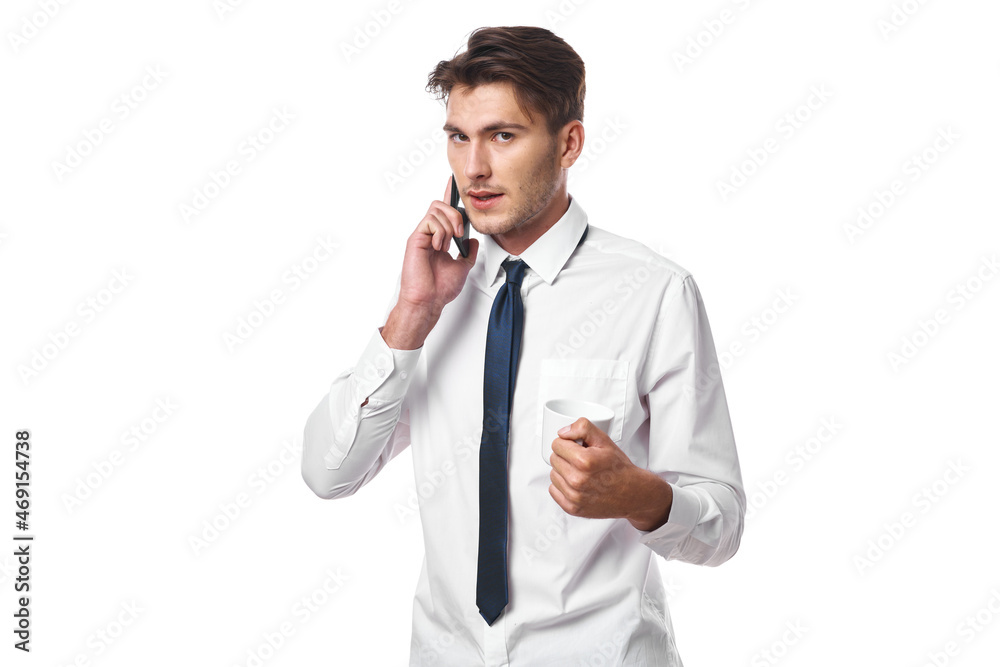 man a cup of coffee talking on the phone official isolated background man a cup of coffee talking on the phone official isolated background