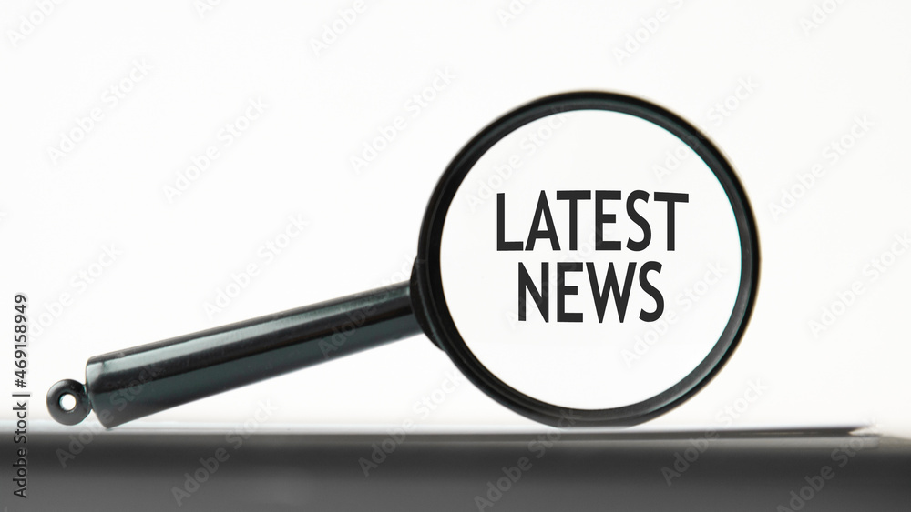 magnifying glass in classic style with the text Latest News magnifying glass in classic style with the text Latest News
