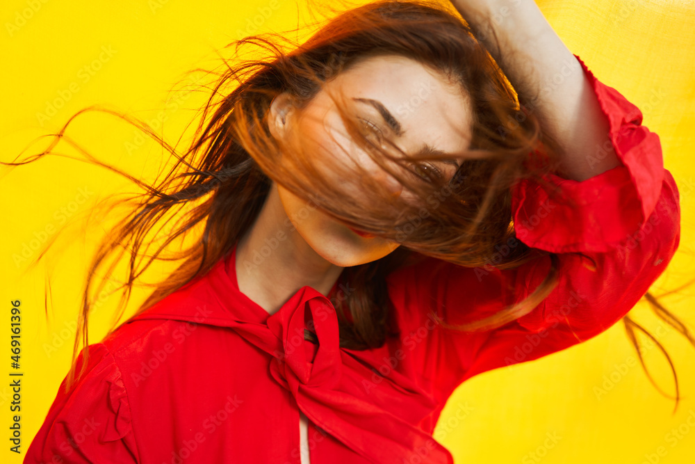 cheerful woman in red dress posing in nature yellow cloth cheerful woman in red dress posing in nature yellow cloth